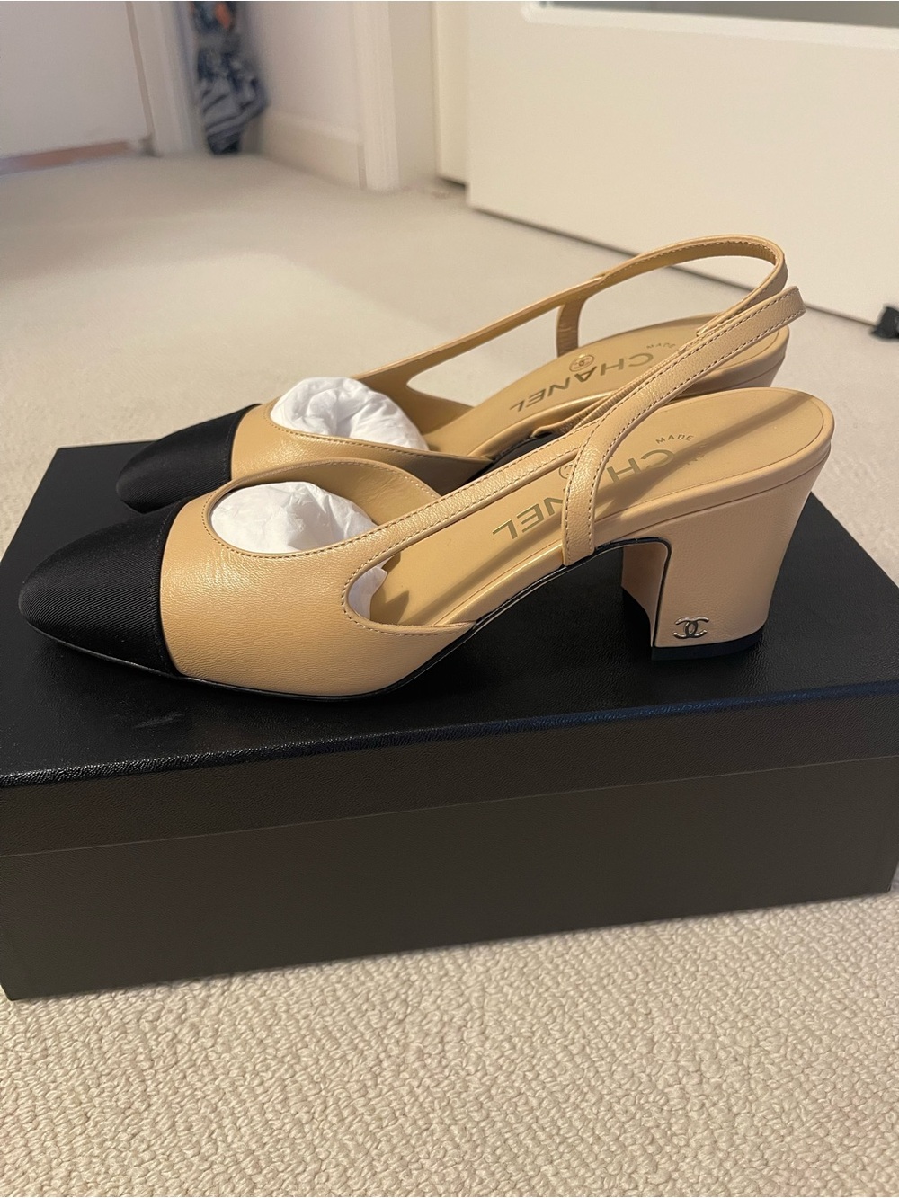 CHANEL Beige and Black Cap-Toe Slingback Pumps